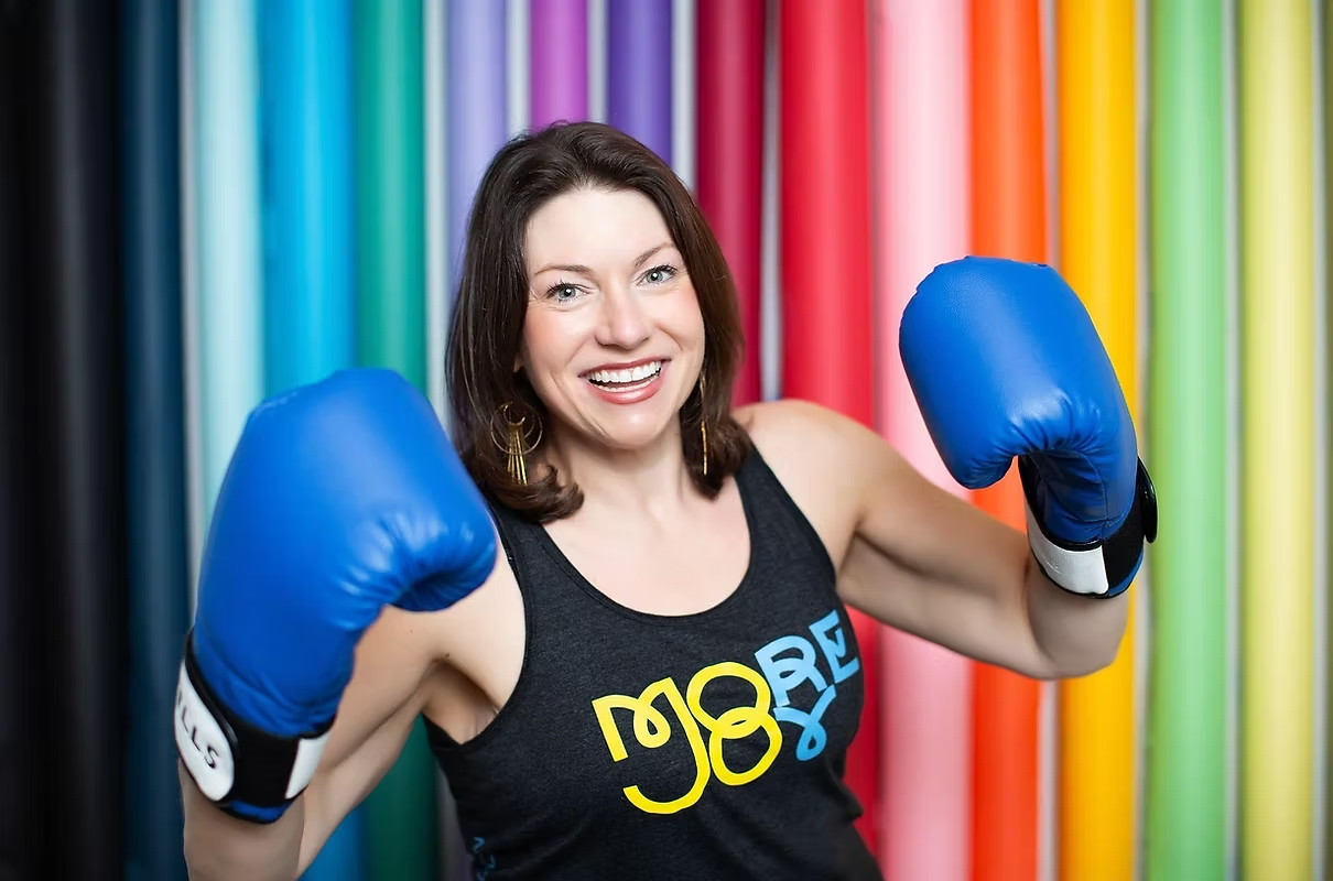 Julie Stevens with boxing gloves.